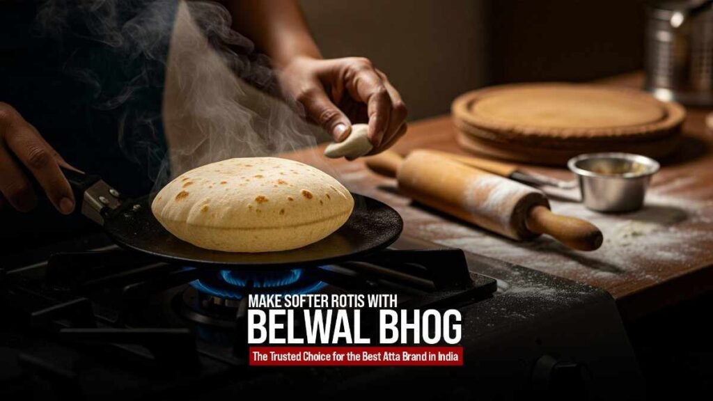 Woman making soft, fluffy rotis on a gas stove using Belwal Bhog flour, the Best Atta Brand in India
