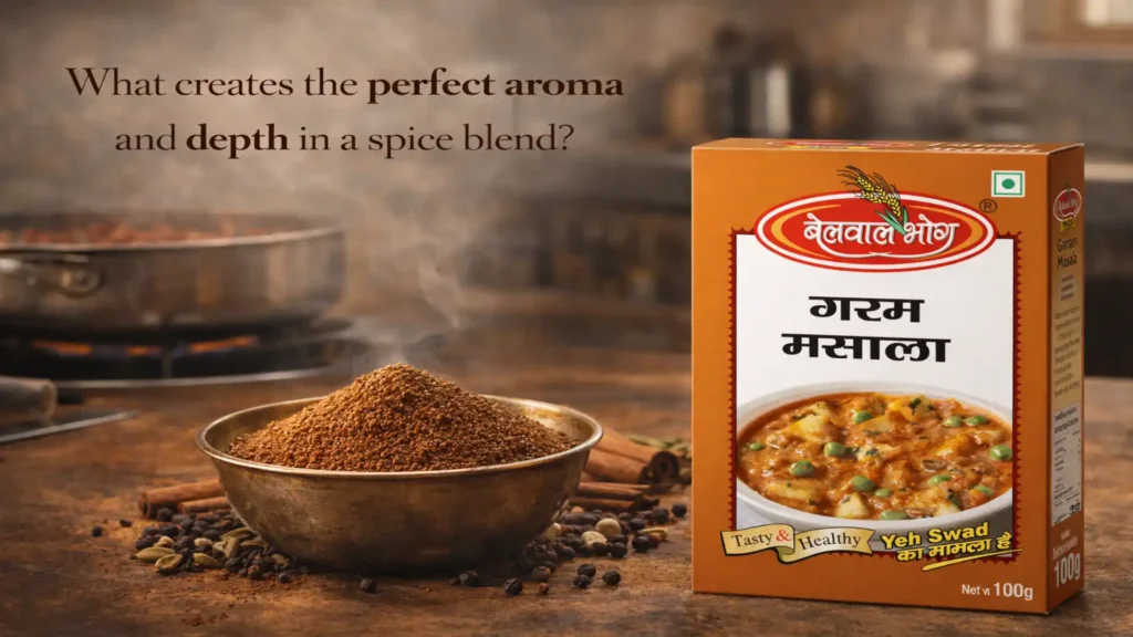 Bowl of freshly ground garam masala spices with whole spices on a kitchen counter and packaged spice box beside it – Best Garam Masala Brand in Bareilly